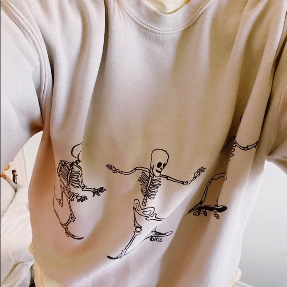 URBAN OUTFITTERS SKELETON SKATER CREWNECK